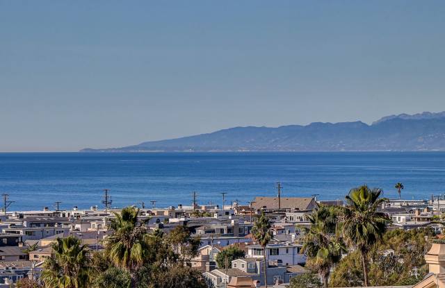 Beautifully Remodeled, 4BR4.5BA Hill Section Home w/ Amazing Panoramic Ocean Views, 3 Decks, Atrium, Yard  4-Car Garage Just 1/2 Mile to Beach!