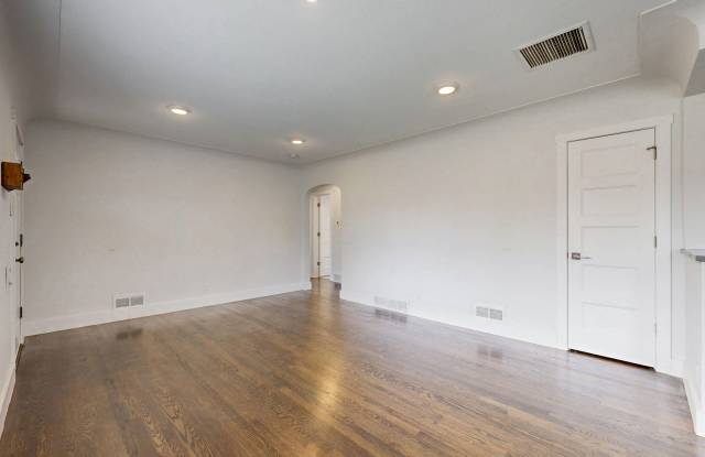 Spacious centrally located 4 bed/2 bath home w/2 car detached garage