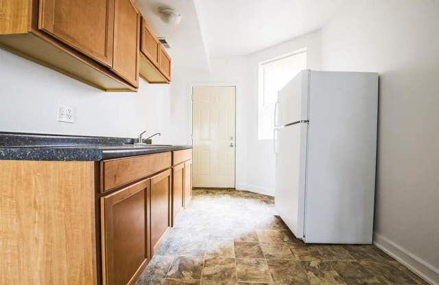 7055 S St Lawrence Apartments