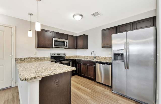 Photo of Luxurious One, Two and four-Bedroom Apartment Homes