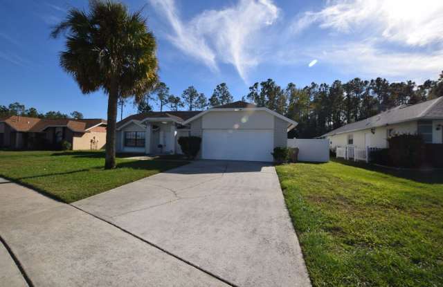 Photo of Beautiful 4 bedrooms/ 2baths home with a 2 car garage for rent at 17790 Indian Ridge Trl S., Kissimmee, FL 34747.
