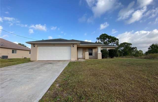 943 Grafton ST - 943 Grafton Street, Lehigh Acres, FL 33974