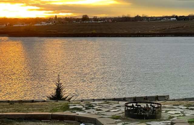 Photo of Waterfront! Sunset views! 3 bdrms! Attached garage! Private driveway!