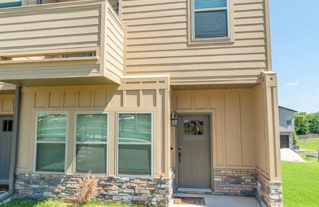 Like New 2BR Condo! Open and Spacious! 2 car garage!