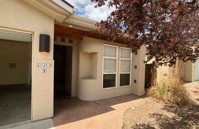 Well-Maintained 3-Bedroom Townhome with 2-Car Garage in Desirable Location!