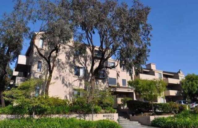 Photo of EPIC REA -End-unit AND TOP TWO floors (penthouse). Spacious modern townhome-style end unit w/ patio  EV parking in Burlingame