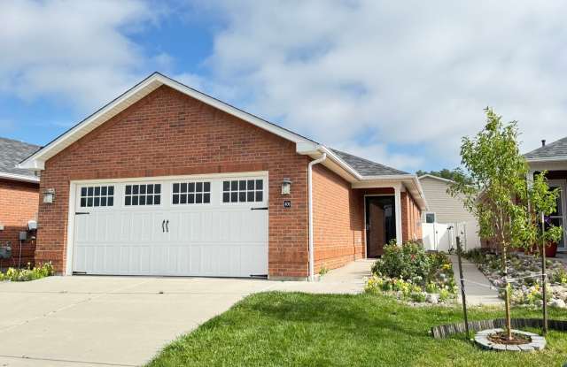 Photo of 4 BEDROOM, 3 BATHROOM TWINHOME WITH 2 CAR ATTACHED GARAGE IN NORTH CHEYENNE