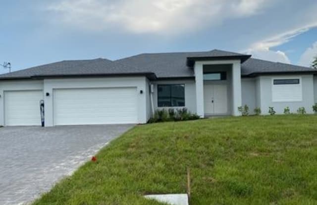 1245 NW 38th Place - 1245 Northwest 38th Place, Cape Coral, FL 33993