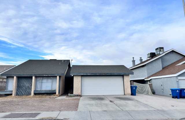 FRESH PAINT INSIDE, 4 BEDROOM HOME HAS A VERY SPACIOUS OPEN LAYOUT THAT FEATURES A FIREPLACE AND SEPARATE HIDDEN KITCHEN SPACE