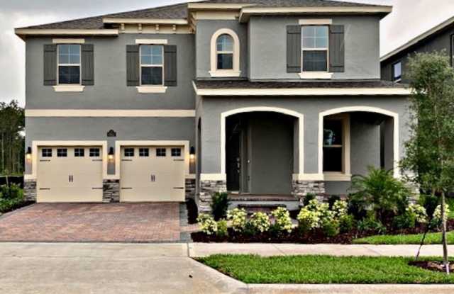 SPECTACULAR MODERN HOME!!Relaxing water views- MOVE IN February 2025-2 story 4 bed 3.5 bath HM in Waterleigh Winter Garden!!