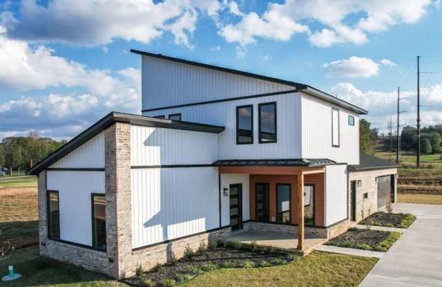 Photo of Lovely Modern Home-Three Bed/Three Bath/Upgraded Features and Fixtures