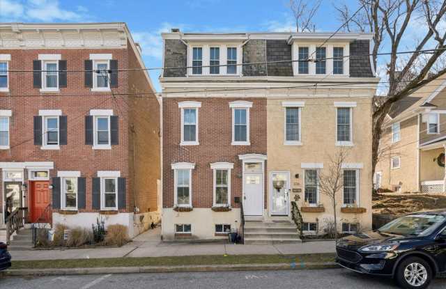 Photo of Stylish Phoenixville Rowhome with Exposed Brick, High Ceilings  Central Air
