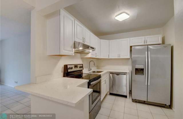 490 NW 20th St