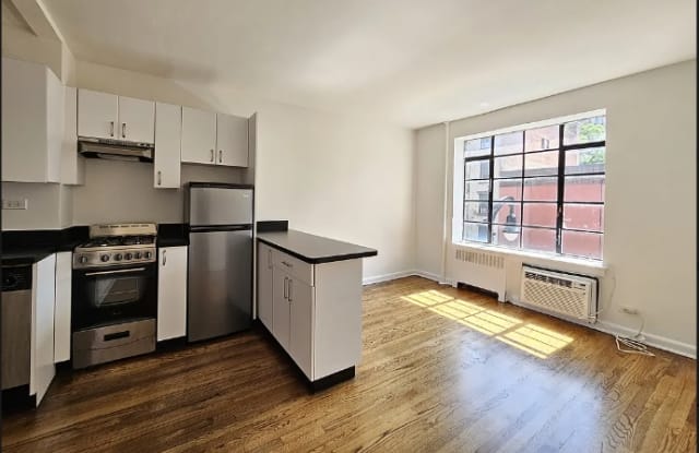 64 W 8th St - 64 West 8th Street, New York City, NY 10011