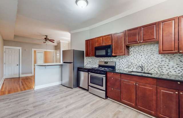 Photo of Spacious 3-Bedroom/1-Bathroom home with Modern Amenities In Charles Village!