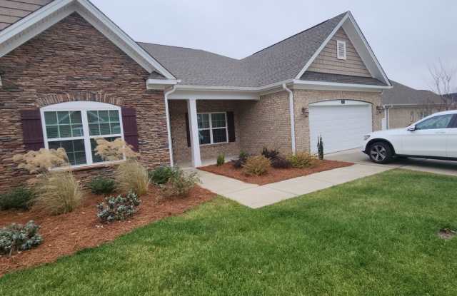 Almost New One -Level Townhouse with 3 Bedrooms, an Office, and Double Garage FOR RENT