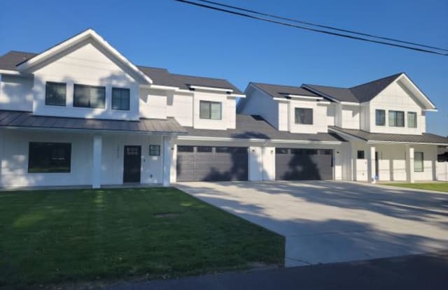Brand New 4 Bed 3 Bath Modern Farmhouse Style Duplex in Mead with over 1850 Sq. Ft. on Huge Lot.