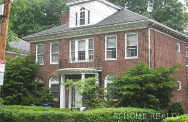 Charming Unit with Laundry in Unit and Parking Included. Professionally Managed