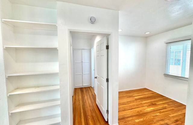 An apartment with character! Hardwood floors, built-ins - TOP FLOOR - 1 Bed / 1 Bath!