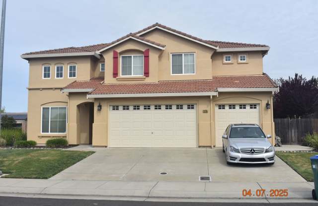 Photo of Gorgeous Four Bedroom Home with Three Car Garage/ Granite Counters/ New Paint and Flooring