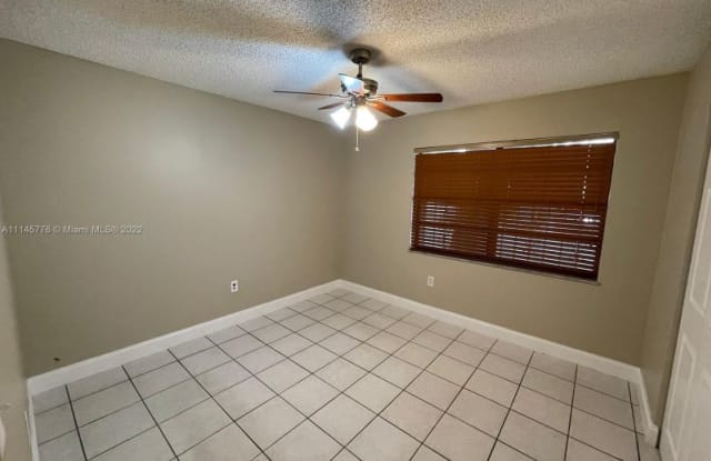 719 SW 101st Court Cir - 719 Southwest 101st Circle, Fountainebleau, FL 33174