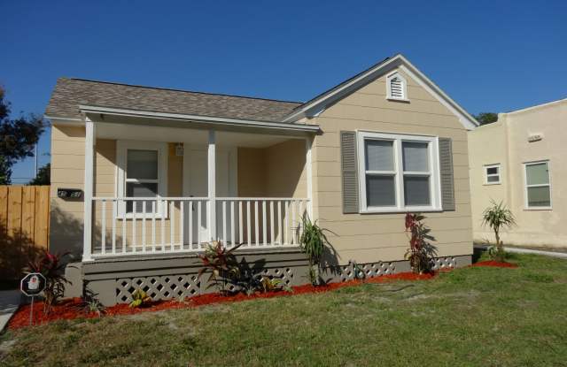 Photo of Three Bedrooms One Bathroom with Shaded Porch