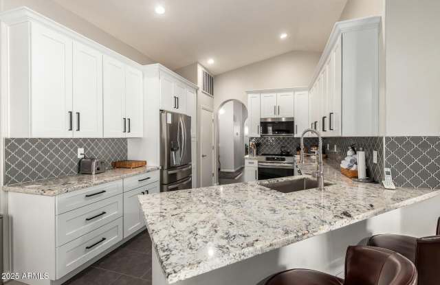 10428 E HERCULES Drive