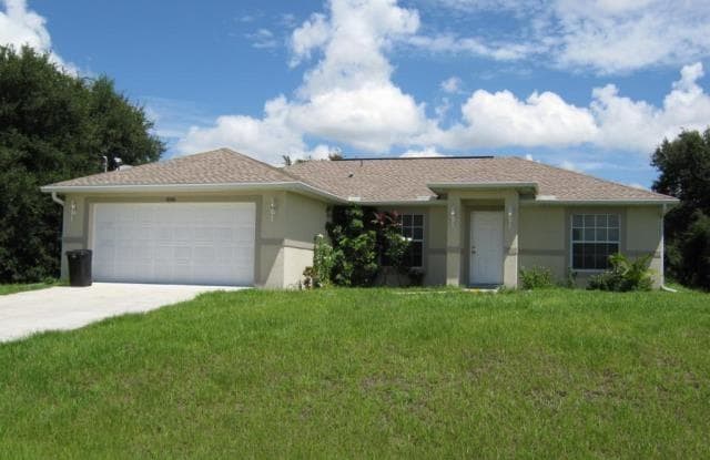 3016 49th ST SW - 3016 49th Street Southwest, Lehigh Acres, FL 33976