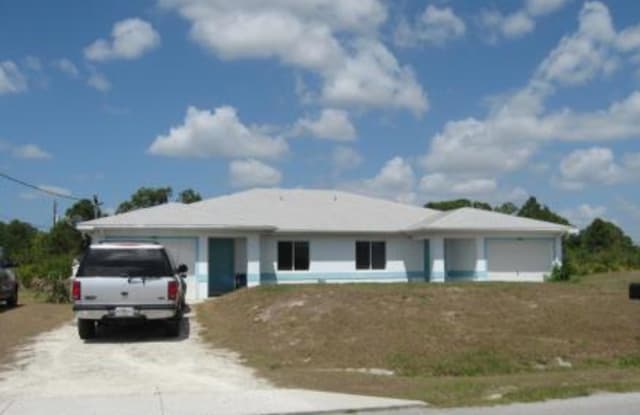 1126 Ivan Ave S - 1126 Ivan Avenue South, Lehigh Acres, FL 33973