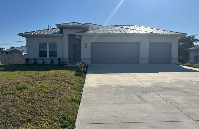 AVAILABLE MID APRIL- 4 Bedroom 2 bathroom 3 Car Garage NE Cape Coral Home with Screened Lania