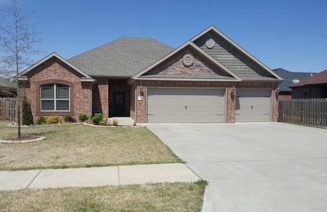 Photo of Beautiful four bedroom 3 bath home with attached 3 car garage in Willowbrook Farms subdivision.