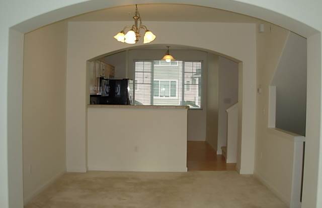 **New Carpet and Paint** Lovely condo in popular Progress Ridge neighborhood!