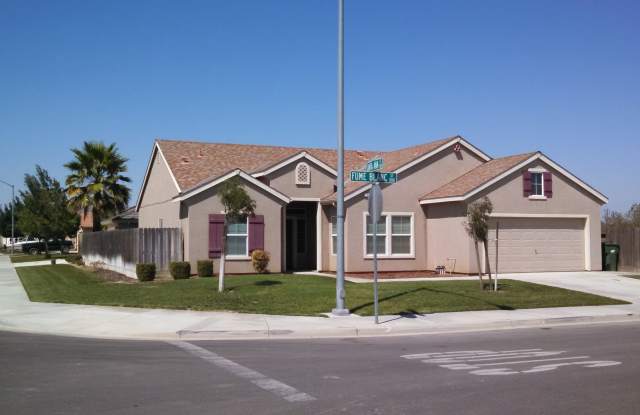 Large Corner Lot Home with Landscaping included!