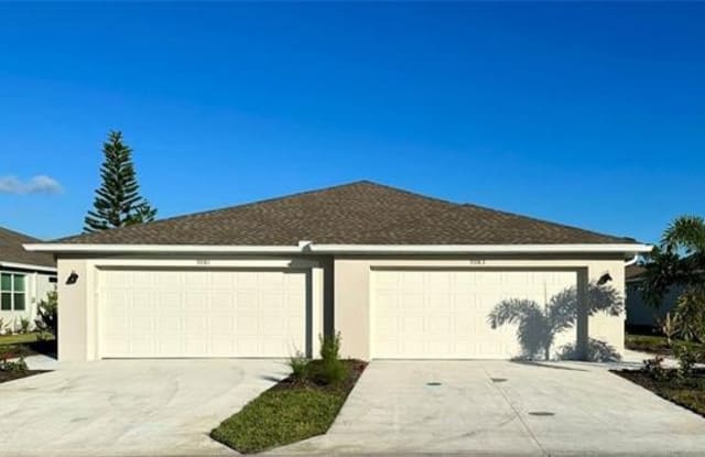 9083 Leatherwood Loop - 9083 Leatherwood Loop, Lehigh Acres, FL 33936