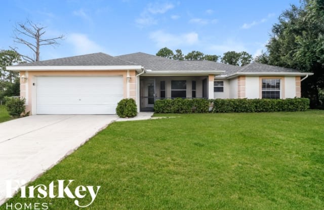 324 Lillon Avenue South - 324 Lillon Avenue South, Lehigh Acres, FL 33974