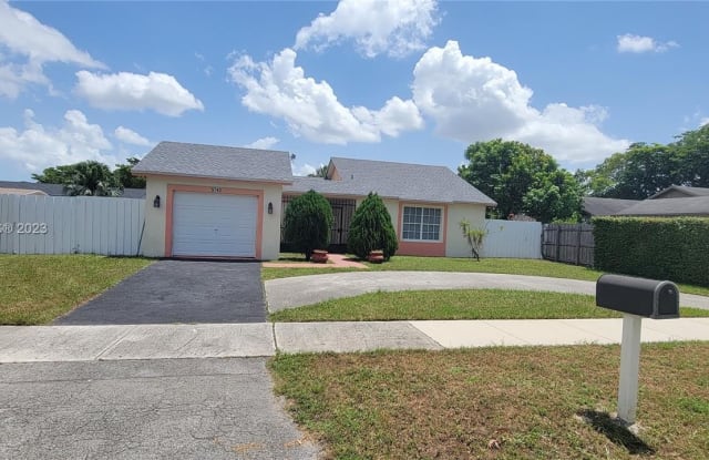 5740 NW 194th Ter - 5740 Northwest 194th Terrace, Country Club, FL 33015