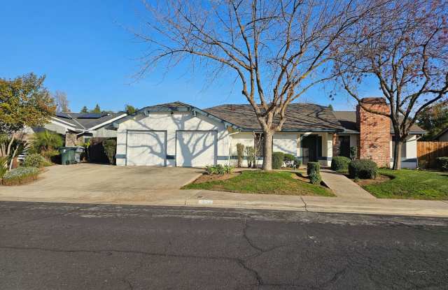 Cute and updated Clovis home offering wonderful amenities, good size lot, a bid backyard + potential RV and or boat parking!