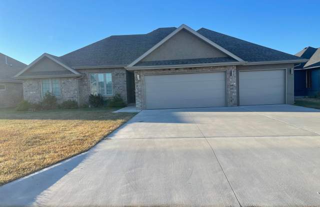 All Brick, 3 bedrooms AND 3 car garage