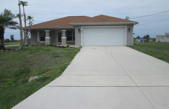 229 NW 7th Ter - 229 Northwest 7th Terrace, Cape Coral, FL 33993