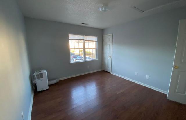 Lovely three bedroom three bath end unit townhouse that is centrally located and close to Camp Lejeune