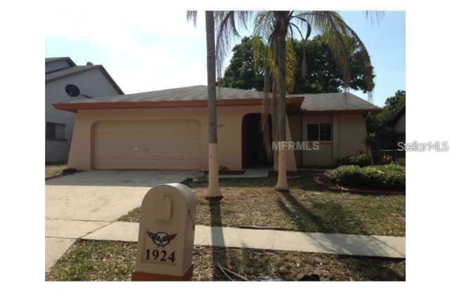 1924 E ORANGESIDE ROAD - 1924 East Orangeside Road, Palm Harbor, FL 34683