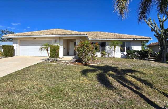 310 CAPRI ISLES COURT