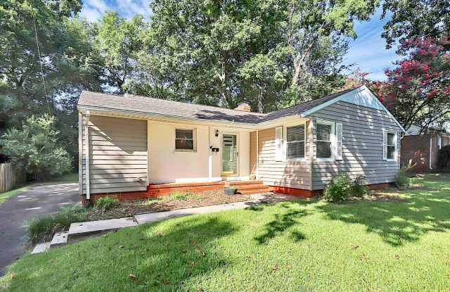 Discover the charm of this brick ranch nestled in the heart of Madison Park