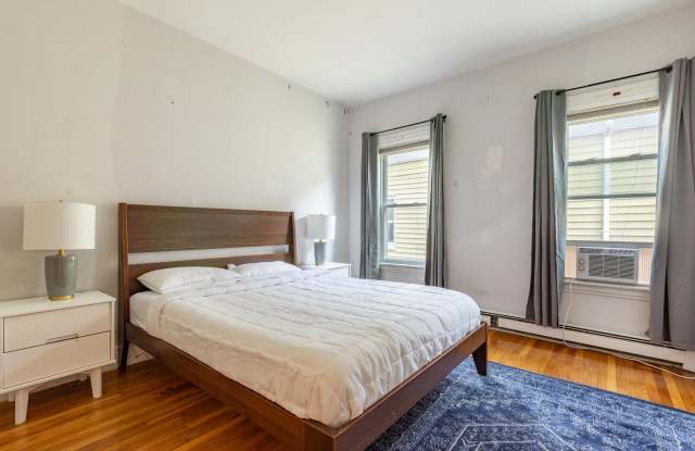 Massive 5 Bed / 2 Bath Duplex in Mission Hill — 2,000 Sq Ft, In-Unit Laundry, Updated Kitchen, Prime Student Location