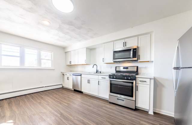 Photo of Available APRIL 2026 - Beautiful Renovated w/ Lots of Natural Light and Backyard Space!