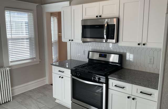 Beautifully Updated 4 BR/2 BA Upper-Level Duplex in Minneapolis with 2-Car Garage!