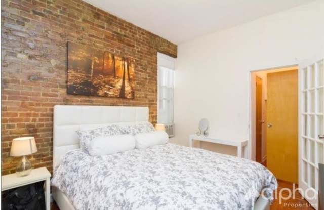 211 E 14 ST.
