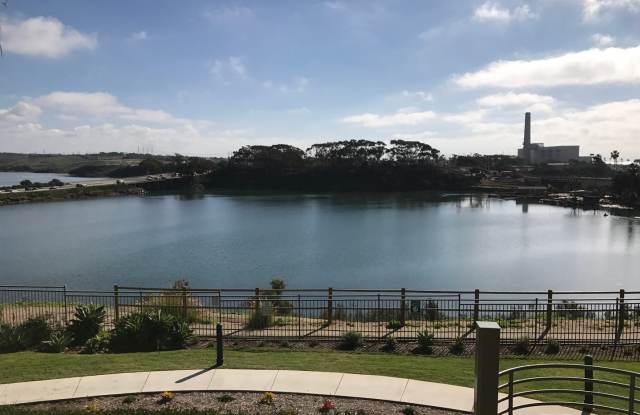 Major Ocean  Lagoon Views from this Beautiful 2 Master Bedroom + Den Ocean Pointe Condo!