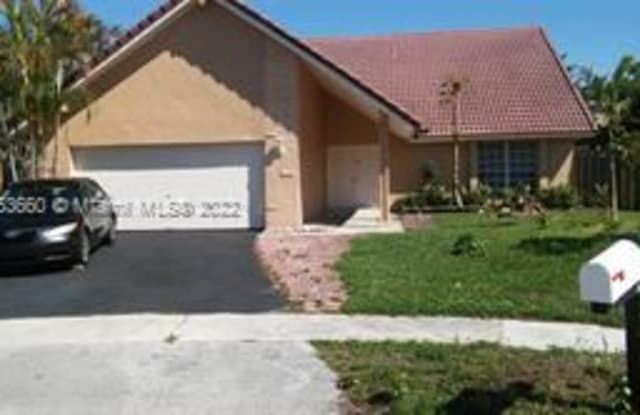 9310 NW 38th Pl - 9310 Northwest 38th Place, Sunrise, FL 33351