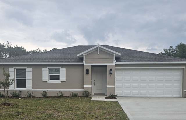 ***** $500 OFF THE 1ST MONTHS RENT! STUNNING BRAND NEW 4/2 HOME IN PALM COAST - 5 Smollett Place, Palm Coast, FL 32164